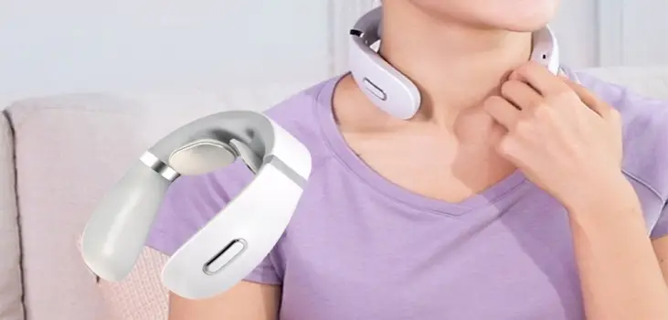 woman using TheraHome Neck Massager for neck pain